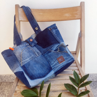 Overview of a KOLLIB patchwork upcycled denim tote bag.