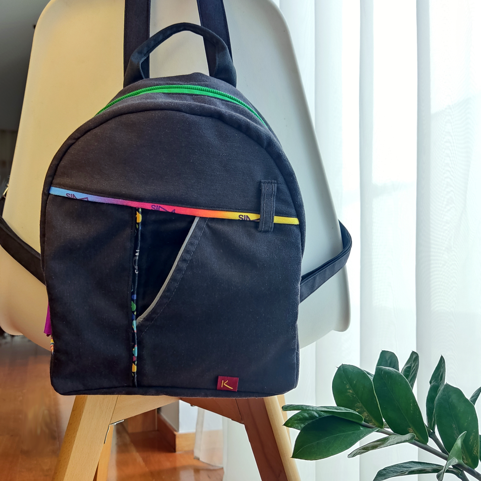 Overview of a KOLLIB grey dark cotton backpack.